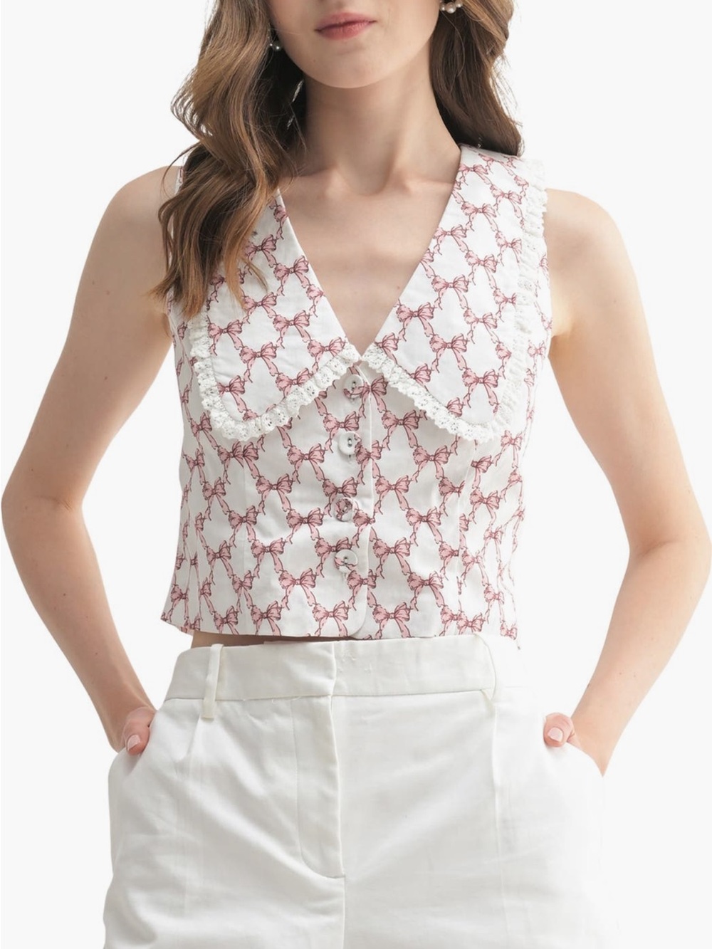 All in Favor White Sleeveless Button Front Top with Pink Bow Print. Like new M
